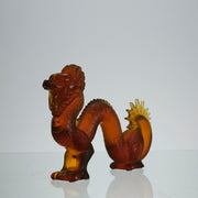 Oriental Dragon by Marie-Claude Lalique A striking mid 20th Century glass study of an Oriental dragon of undulating form with very fine hand chased surface detail and dramatic orange colour