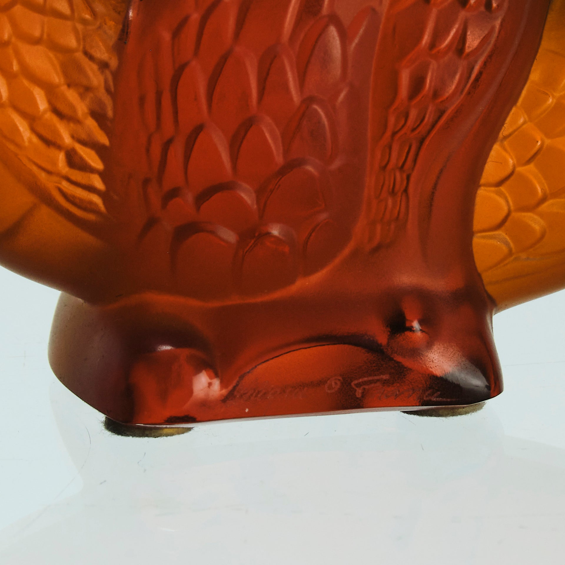Oriental Dragon by Marie-Claude Lalique A striking mid 20th Century glass study of an Oriental dragon of undulating form with very fine hand chased surface detail and dramatic orange colour