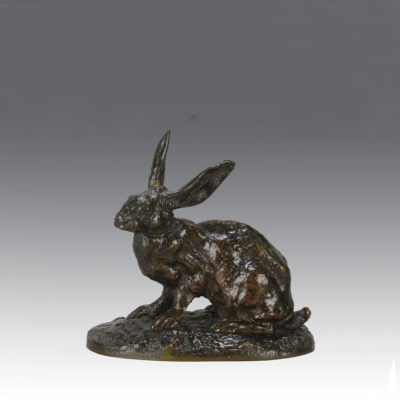 Lapin au Repos Antique bronze statue of a seated rabbit with excellent hand chased surface detail and very fine rich dark brown and golden patina. Raised on naturalistic base 