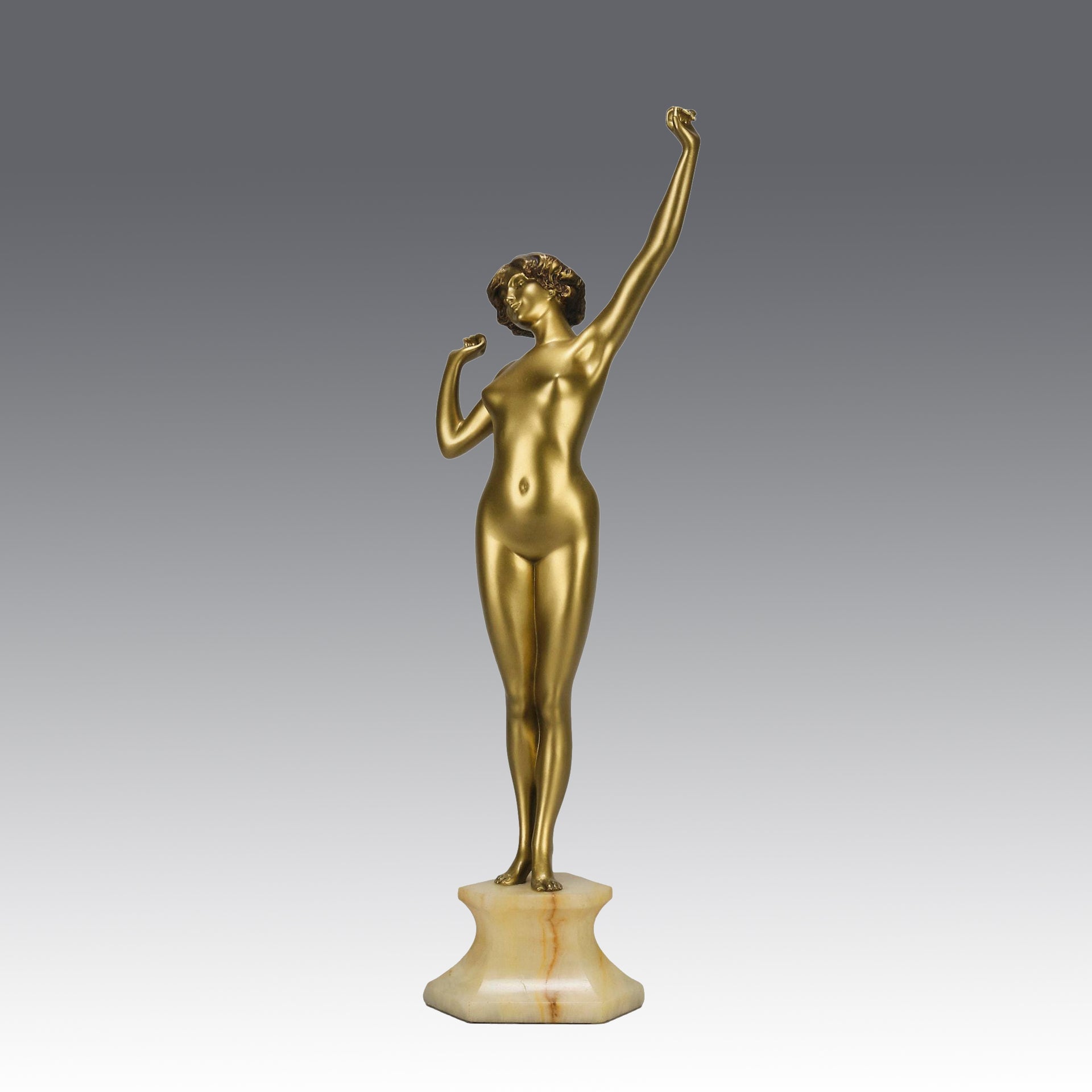 Art Deco Sculpture Le Reveil by Paul Philippe painted gilt and enamel bronze a attractive young woman as she stretches in the morning, raised on a shaped marble base