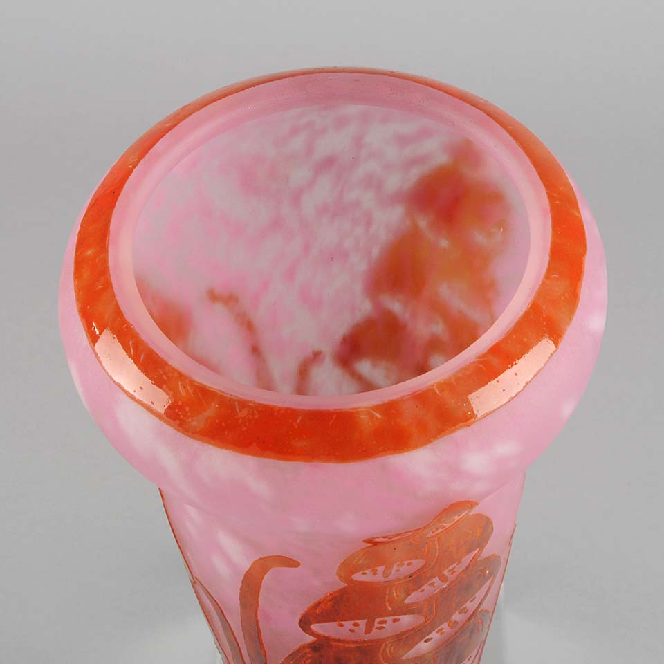Digitale Vase by Le Verre Francais a striking cameo glass vase decorated with a red and maroon Art Deco design of digitalis flowers against a light pink field