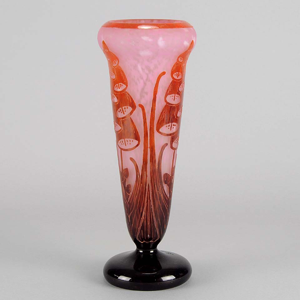 Digitale Vase by Le Verre Francais a striking cameo glass vase decorated with a red and maroon Art Deco design of digitalis flowers against a light pink field