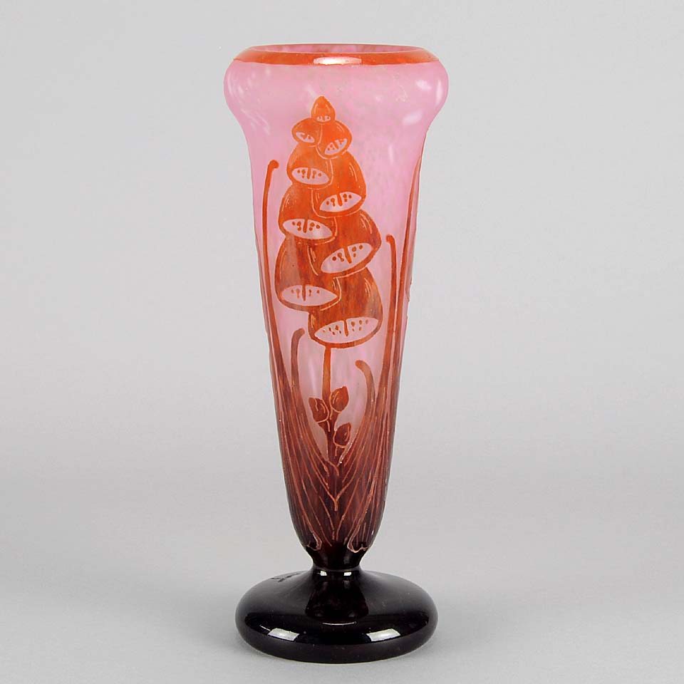 Digitale Vase by Le Verre Francais a striking cameo glass vase decorated with a red and maroon Art Deco design of digitalis flowers against a light pink field