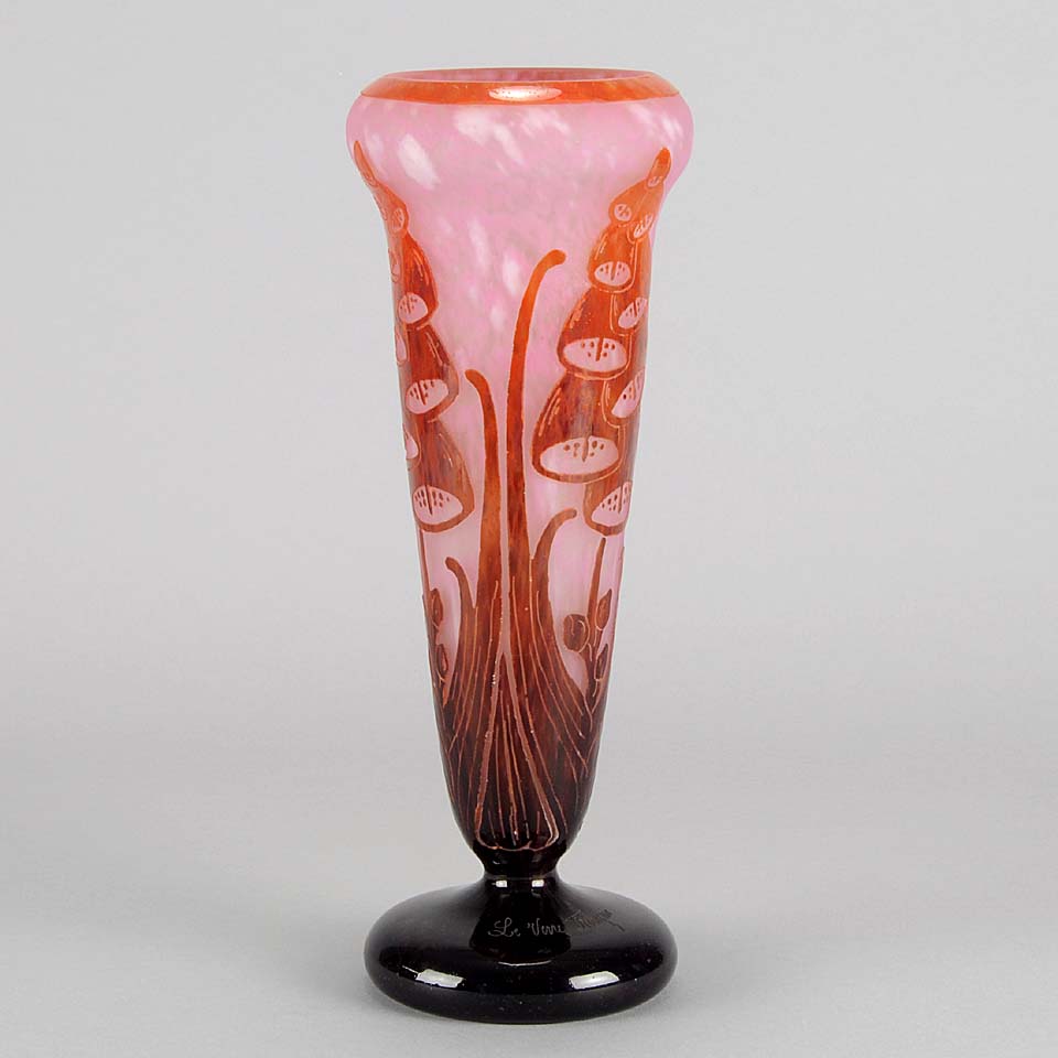 Digitale Vase by Le Verre Francais a striking cameo glass vase decorated with a red and maroon Art Deco design of digitalis flowers against a light pink field