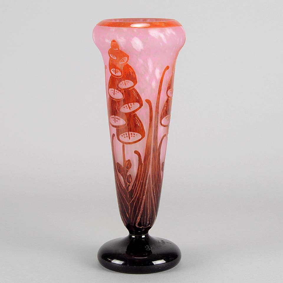 Digitale Vase by Le Verre Francais a striking cameo glass vase decorated with a red and maroon Art Deco design of digitalis flowers against a light pink field