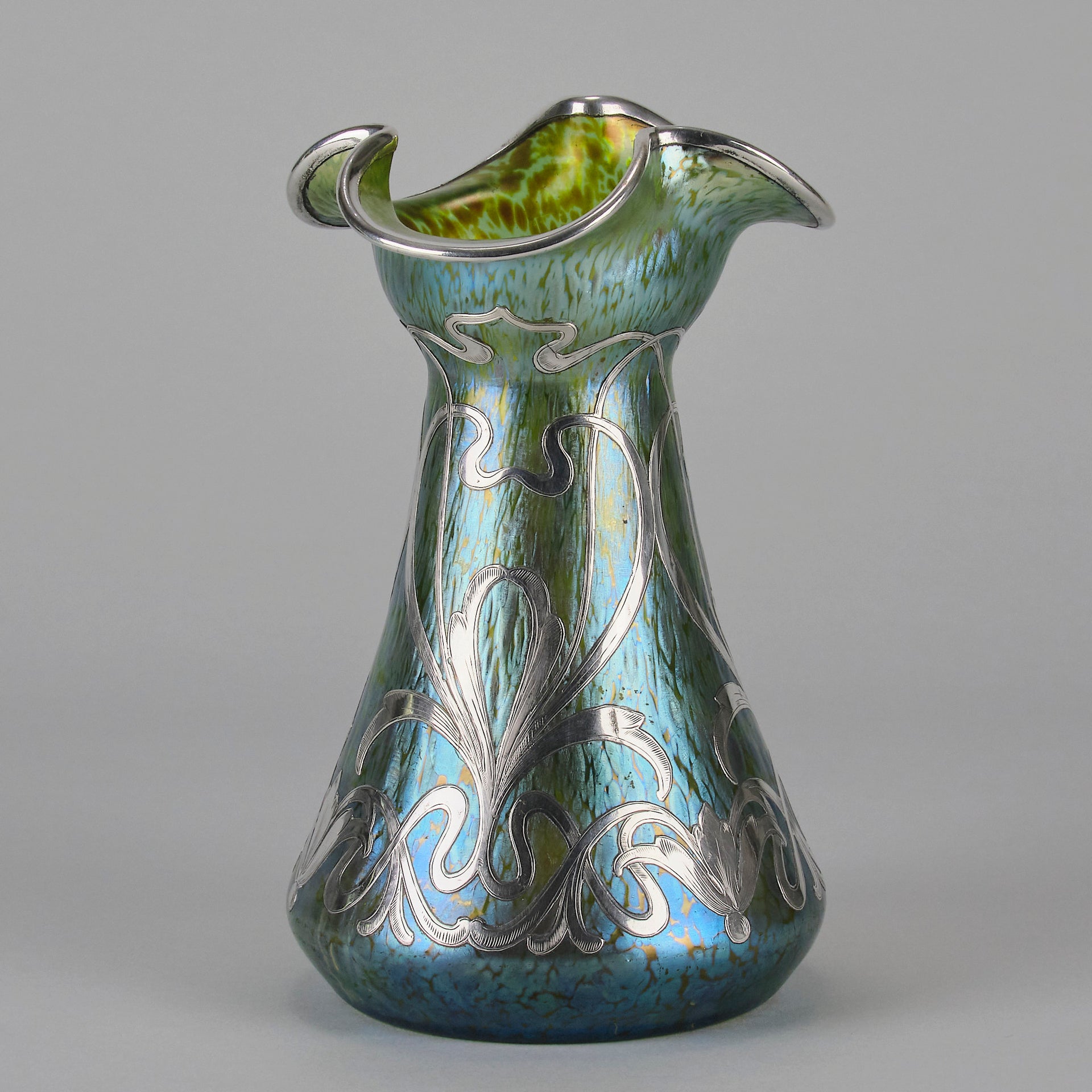 Silvered Papillon Vase by Loetz Witwe Art Nouveau tourquoise papillon glass vase, decorated with an applied silver floral organic pattern that wraps around the circumference of the body