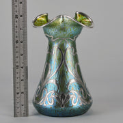 Silvered Papillon Vase by Loetz Witwe Art Nouveau tourquoise papillon glass vase, decorated with an applied silver floral organic pattern that wraps around the circumference of the body