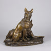 Two Alsatians by Louis Riché  gilt bronze group of two Alsatians, one seated in alert pose with its head turned slightly and ears pricked whilst the other one lays in an alert pose