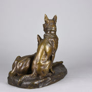 Two Alsatians by Louis Riché  gilt bronze group of two Alsatians, one seated in alert pose with its head turned slightly and ears pricked whilst the other one lays in an alert pose