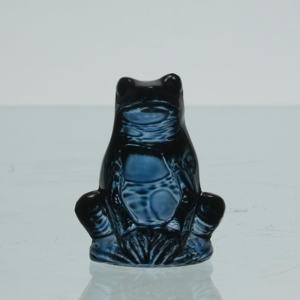 La Grenouille Bleu by Marc Lalique a charming mid 20th Century dark blue polished glass study of a seated frog with a charming look upon its face
