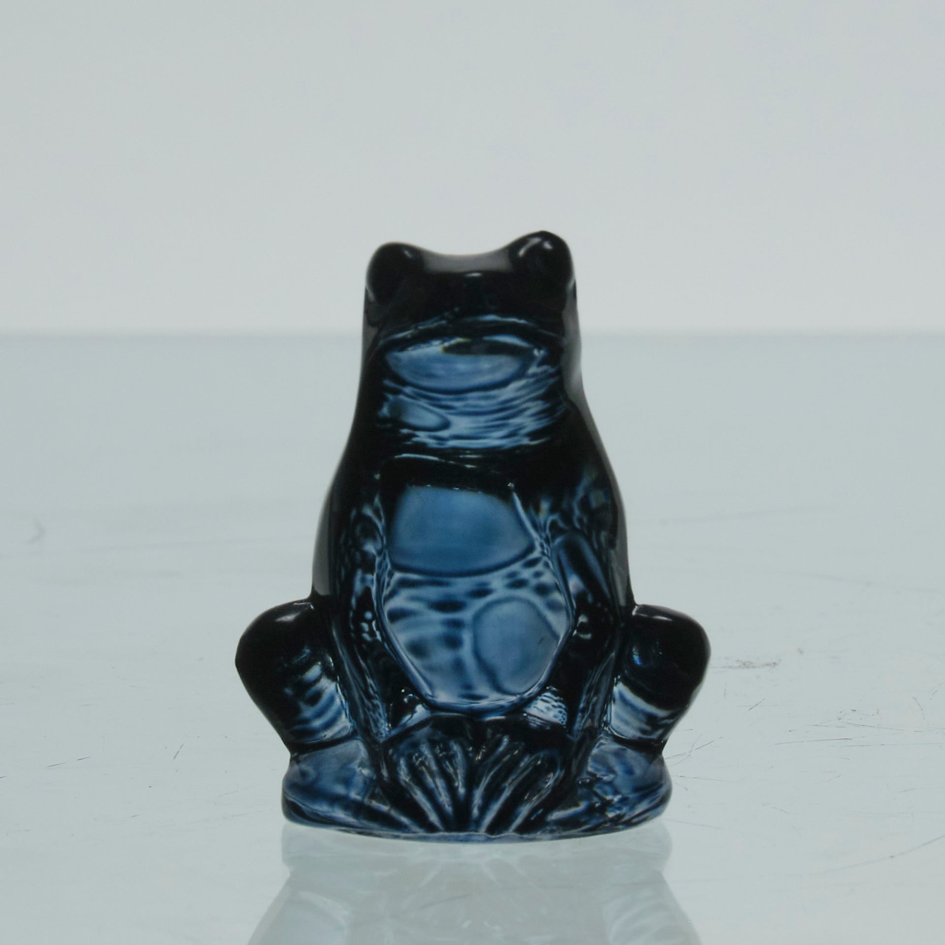 La Grenouille Bleu by Marc Lalique a charming mid 20th Century dark blue polished glass study of a seated frog with a charming look upon its face