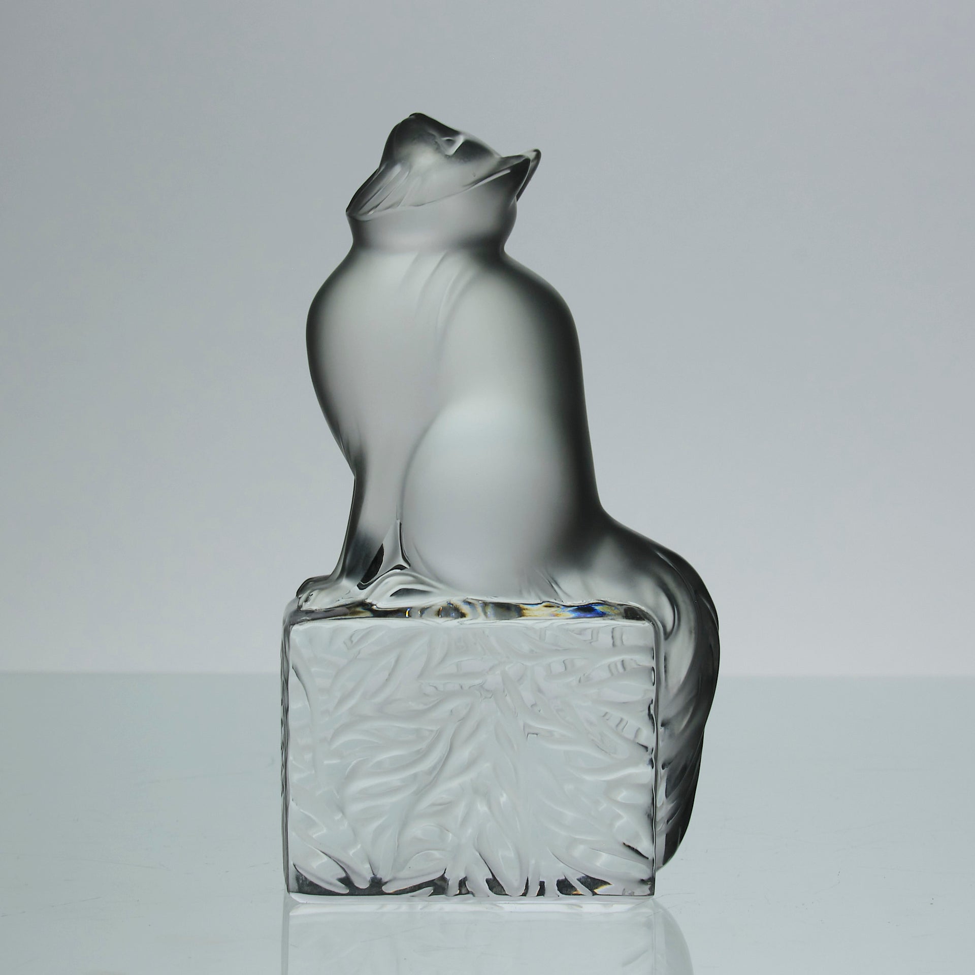 Chat Attente a charming frosted glass study of a seated cat with its head raised in a concentrated pose by Marc Lalique