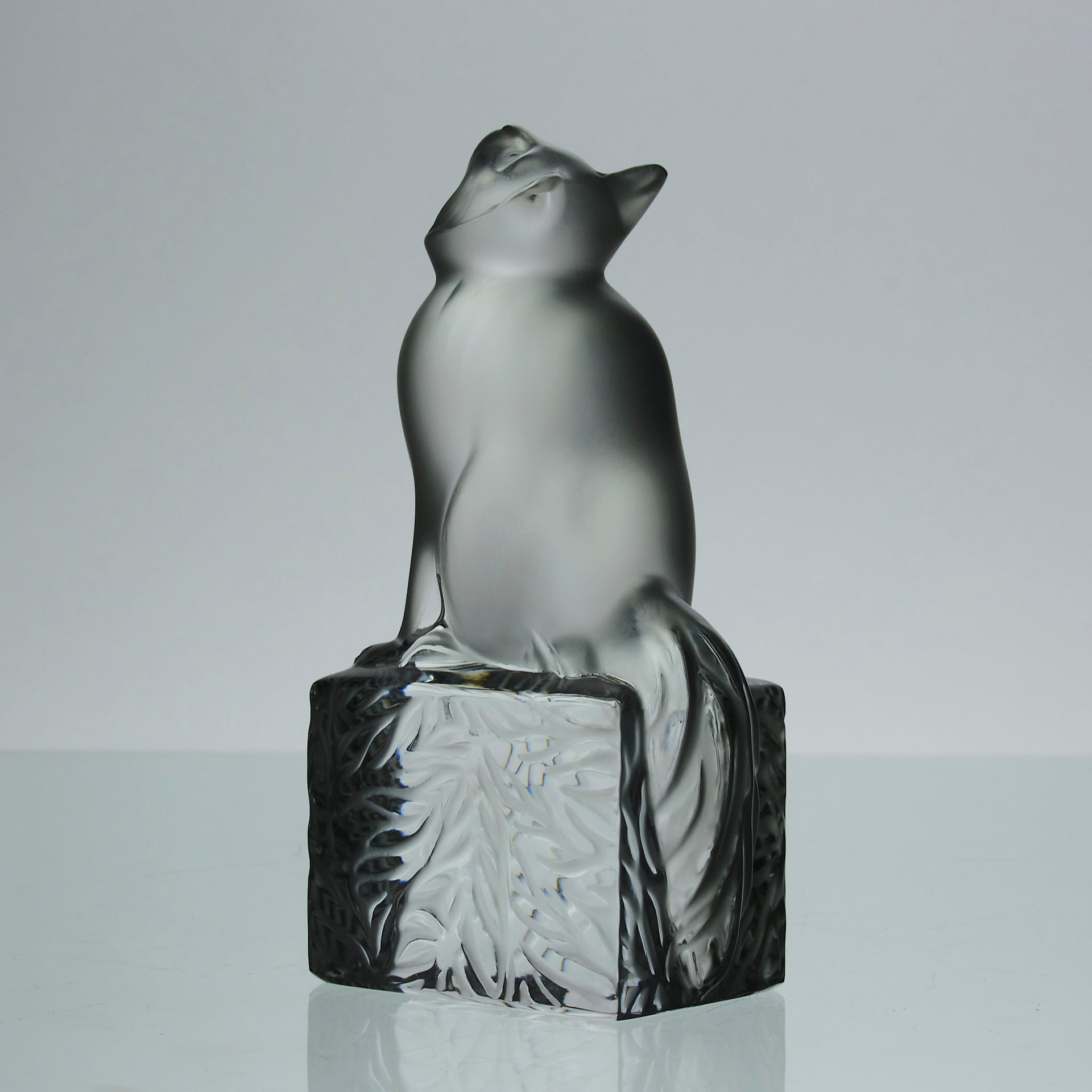Chat Attente a charming frosted glass study of a seated cat with its head raised in a concentrated pose by Marc Lalique