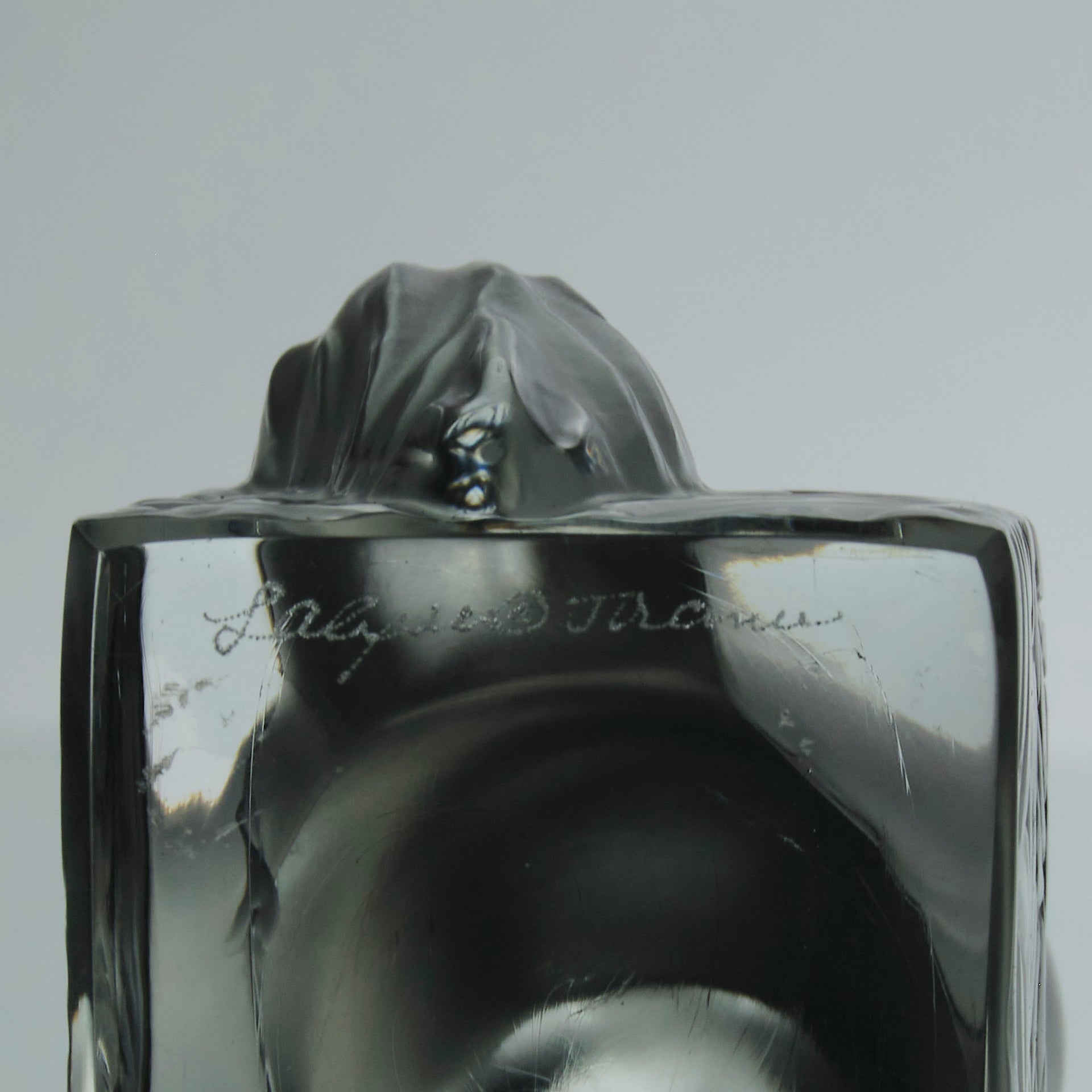 Chat Attente a charming frosted glass study of a seated cat with its head raised in a concentrated pose by Marc Lalique