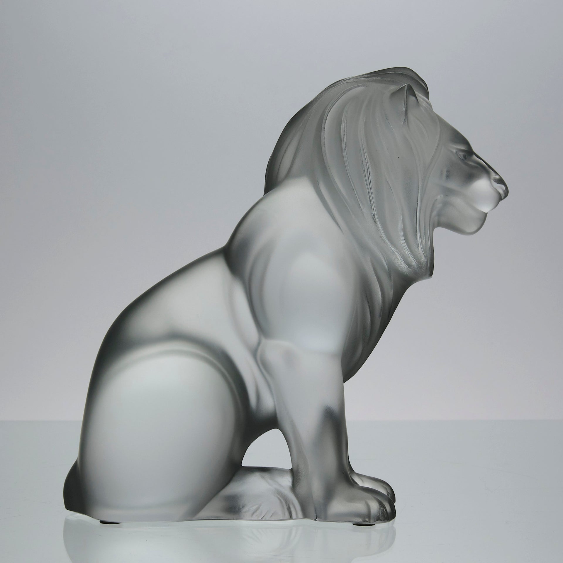 Lion Assis by Marc Lalique A majestic mid 20th Century frosted glass study of a seated lion