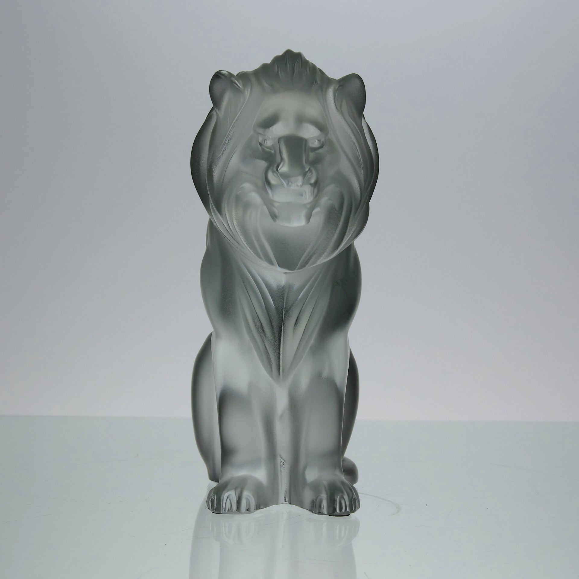 Lion Assis by Marc Lalique A majestic mid 20th Century frosted glass study of a seated lion