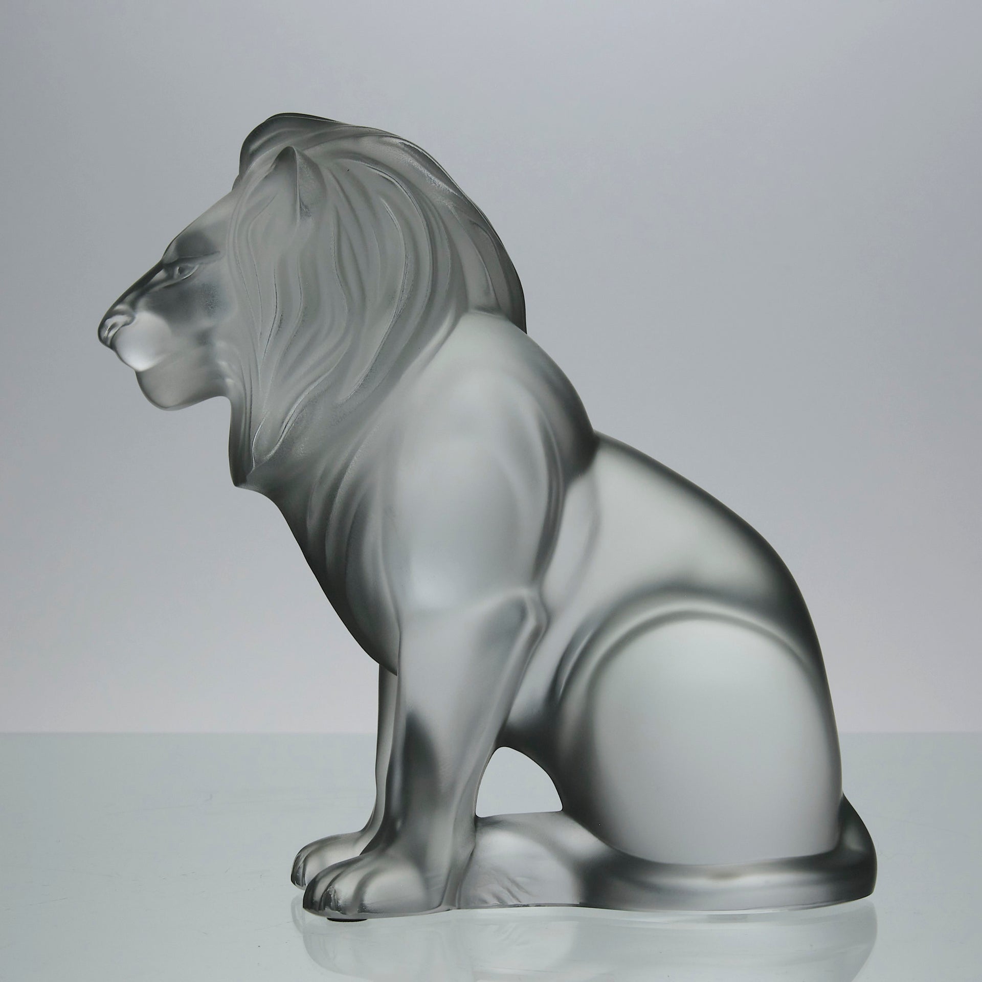 Lion Assis by Marc Lalique A majestic mid 20th Century frosted glass study of a seated lion