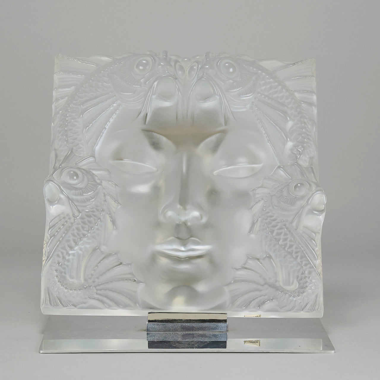Masque De Femme by Marc Lalique An excellent mid 20th Century clear and frosted glass wall plaque decorated with a pretty Art Deco face framed with exotic fish