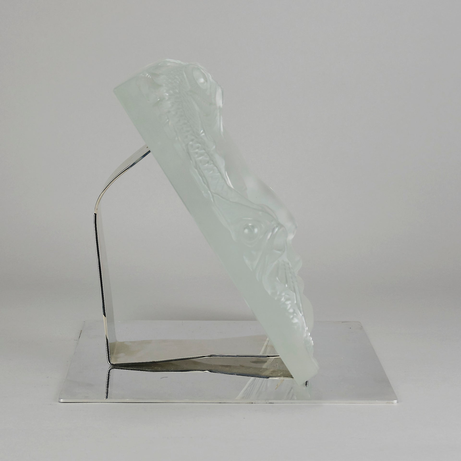 Masque De Femme by Marc Lalique An excellent mid 20th Century clear and frosted glass wall plaque decorated with a pretty Art Deco face framed with exotic fish