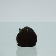 Ours Repose by Marc Lalique A sweet mid 20th Century frosted glass study of a resting bear, exhibiting excellent hand finished surface detail and rich deep amber colour