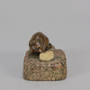 Antique Bronze Statue of a mouse nibbling some cheese depicted in cream marble. The bronze study exhibiting excellent hand chased surface detail and good colour, raised on a rough hewn granite base