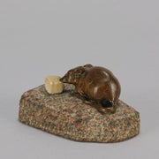 Antique Bronze Statue of a mouse nibbling some cheese depicted in cream marble. The bronze study exhibiting excellent hand chased surface detail and good colour, raised on a rough hewn granite base
