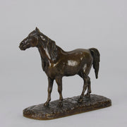 Cheval Arabe - Ibrahim No.3 Antique Bronze statue of 'Ibrahim' an Arab Stallion by Pierre-Jules Mêne standing with wonderful rich brown colour lightly rubbed to a golden hue hand finished with intricate surface detail standing on a naturalistic rectangular base
