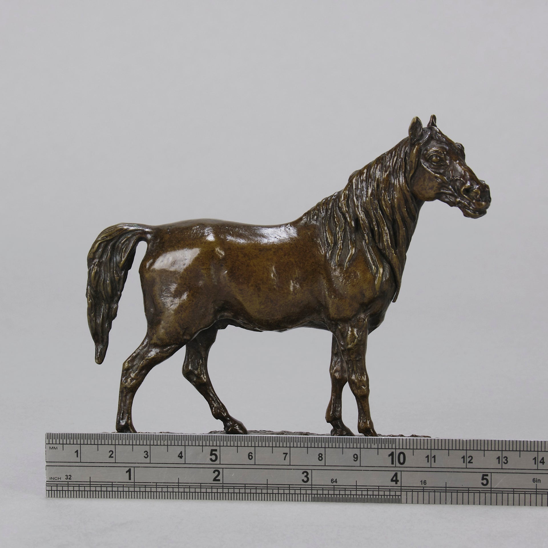 Cheval Arabe - Ibrahim No.3 Antique Bronze statue of 'Ibrahim' an Arab Stallion by Pierre-Jules Mêne standing with wonderful rich brown colour lightly rubbed to a golden hue hand finished with intricate surface detail standing on a naturalistic rectangular base