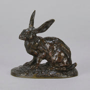 Lapin au Repos Antique bronze statue of a seated rabbit with excellent hand chased surface detail and very fine rich dark brown and golden patina. Raised on naturalistic base 