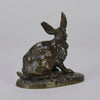 Lapin au Repos Antique bronze statue of a seated rabbit with excellent hand chased surface detail and very fine rich dark brown and golden patina. Raised on naturalistic base 