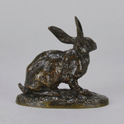 Lapin au Repos Antique bronze statue of a seated rabbit with excellent hand chased surface detail and very fine rich dark brown and golden patina. Raised on naturalistic base 