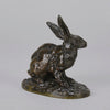 Lapin au Repos Antique bronze statue of a seated rabbit with excellent hand chased surface detail and very fine rich dark brown and golden patina. Raised on naturalistic base 