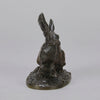 Lapin au Repos Antique bronze statue of a seated rabbit with excellent hand chased surface detail and very fine rich dark brown and golden patina. Raised on naturalistic base 