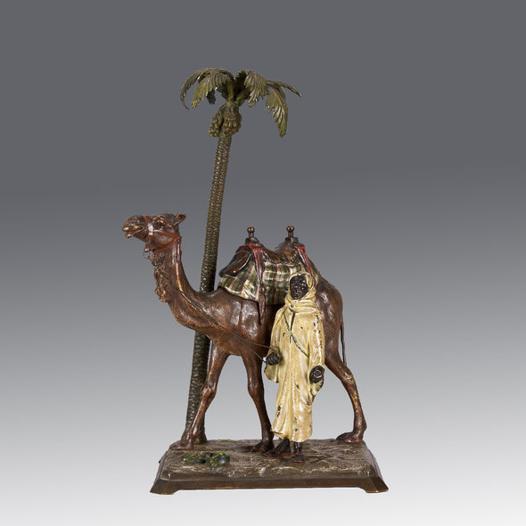 “Bedouin with camel under Palm Tree” by Franz Bergman