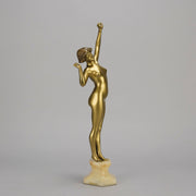 Art Deco Sculpture Le Reveil by Paul Philippe painted gilt and enamel bronze a attractive young woman as she stretches in the morning, raised on a shaped marble base