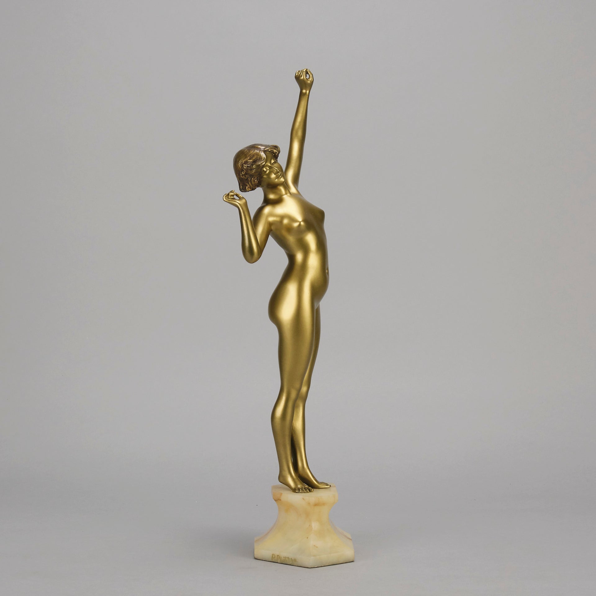 Art Deco Sculpture Le Reveil by Paul Philippe painted gilt and enamel bronze a attractive young woman as she stretches in the morning, raised on a shaped marble base