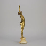 Art Deco Sculpture Le Reveil by Paul Philippe painted gilt and enamel bronze a attractive young woman as she stretches in the morning, raised on a shaped marble base