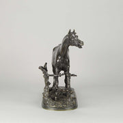 Djinn - Etalon Barbe by Antoine louis barye an antique bronze study of a stallion standing behind a post and rail fence