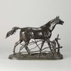 Djinn - Etalon Barbe by Antoine louis barye an antique bronze study of a stallion standing behind a post and rail fence