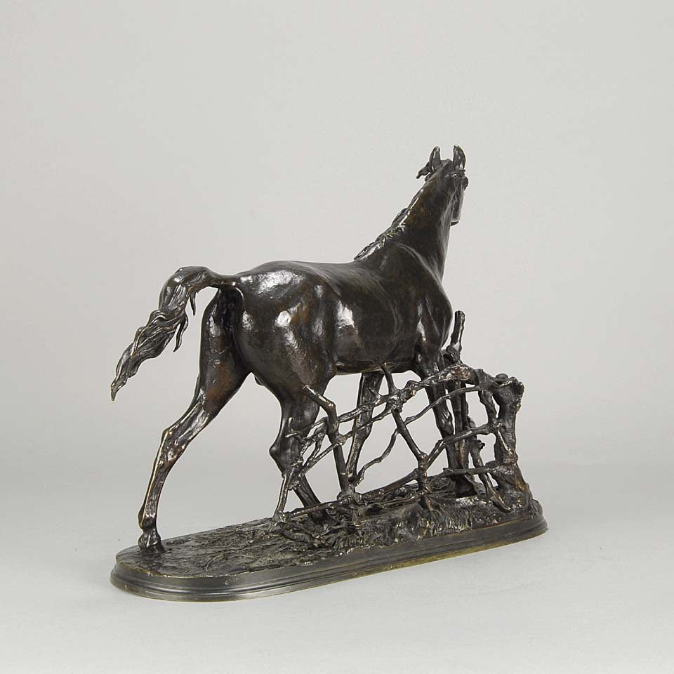 Djinn - Etalon Barbe by Antoine louis barye an antique bronze study of a stallion standing behind a post and rail fence