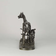 Djinn - Etalon Barbe by Antoine louis barye an antique bronze study of a stallion standing behind a post and rail fence