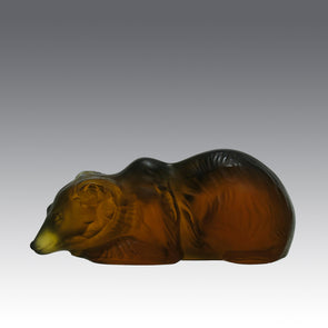 Ours Repose by Marc Lalique A sweet mid 20th Century frosted glass study of a resting bear, exhibiting excellent hand finished surface detail and rich deep amber colour