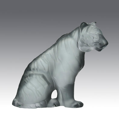Tigre Assis - A Lalique frosted glass and clear glass figure of a seated tiger with polished stripes