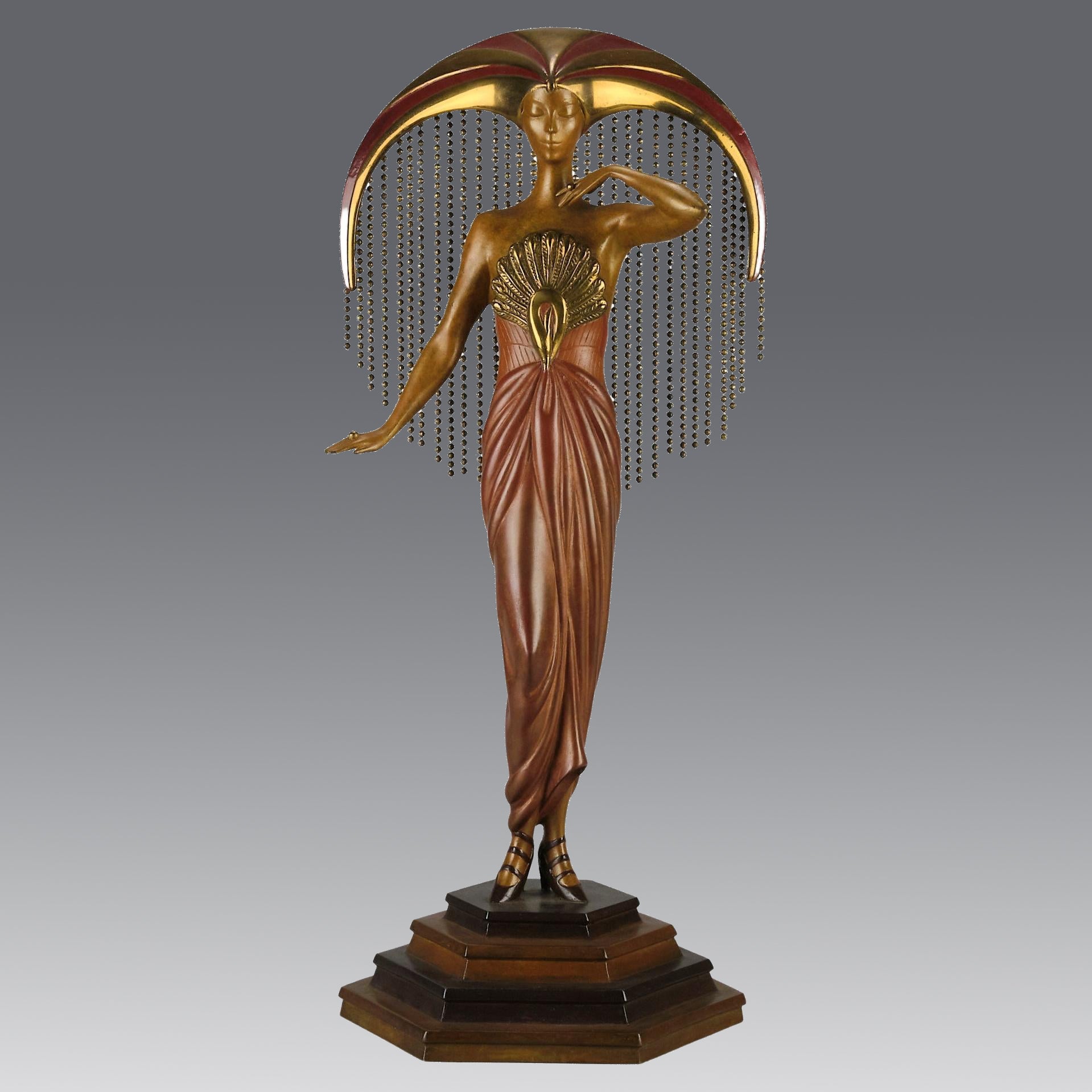 Le Soleil by Erte Art Deco bronze of a beautiful young woman in diaphanous dress wearing a spectacular headdress of circular form representing the sun - Hickmet Fine Arts