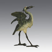 A Standing Stork with Fish Antique Bronze Statue by Franz Bergman exhibiting very fine cold painted colours and good hand finished surface detail