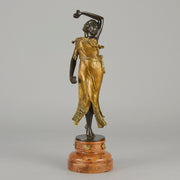 Flamenco Dancer by T Curts a charming Art Nouveau bronze figure of a flamboyant flamenco dancer holding a striking pose, her diaphonous gilded dress seductively draped over her, pinned and hinged to be removed in order to reveal her beautiful naked body