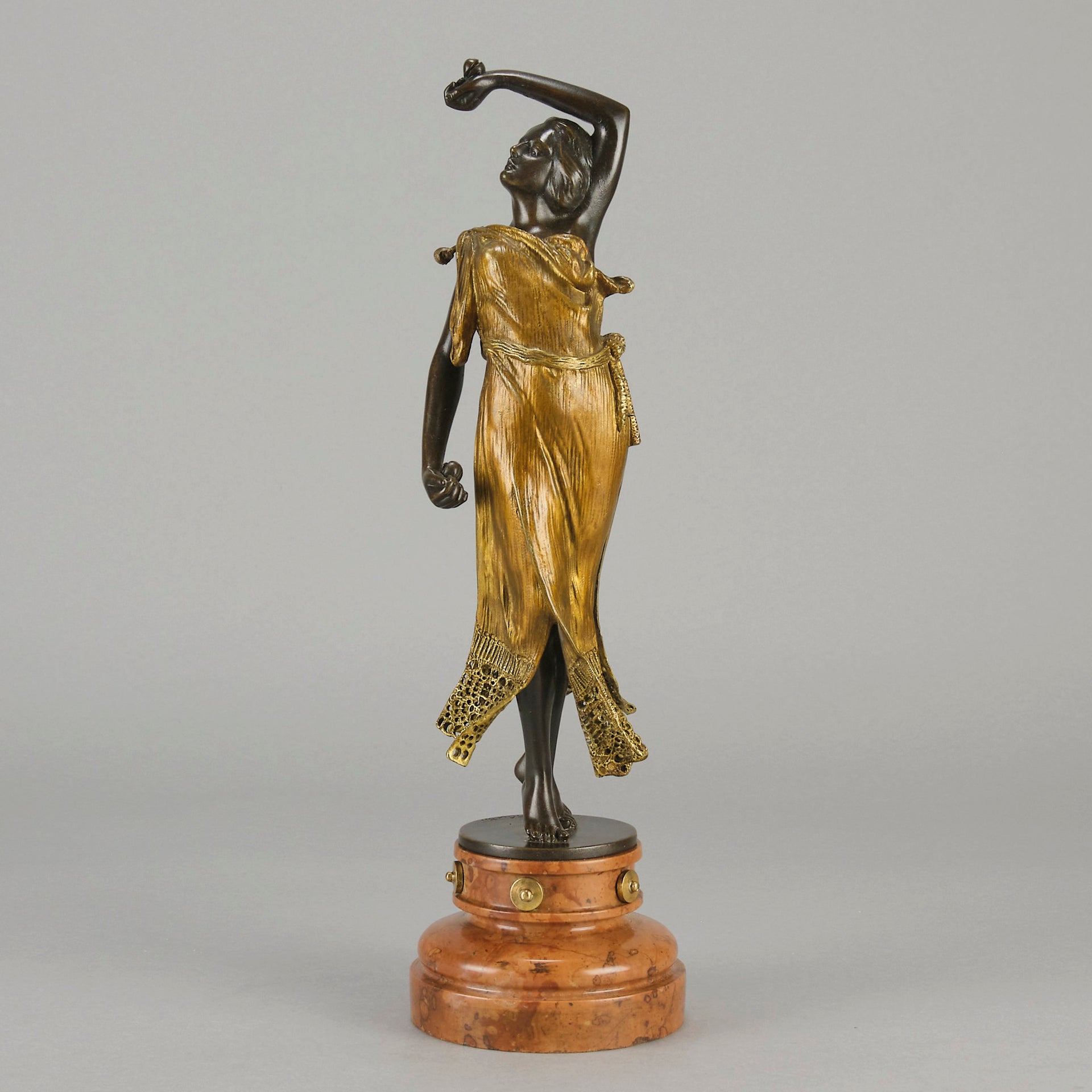 Flamenco Dancer by T Curts a charming Art Nouveau bronze figure of a flamboyant flamenco dancer holding a striking pose, her diaphonous gilded dress seductively draped over her, pinned and hinged to be removed in order to reveal her beautiful naked body