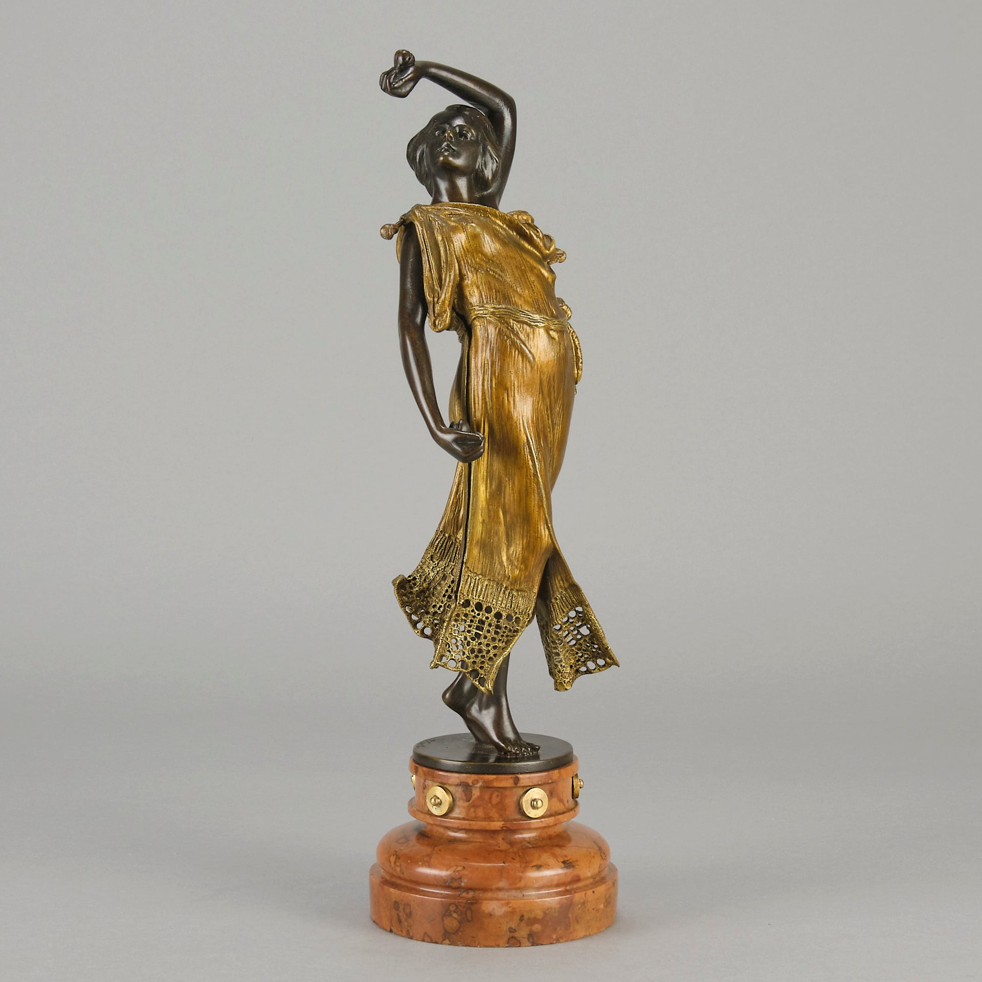 Flamenco Dancer by T Curts a charming Art Nouveau bronze figure of a flamboyant flamenco dancer holding a striking pose, her diaphonous gilded dress seductively draped over her, pinned and hinged to be removed in order to reveal her beautiful naked body