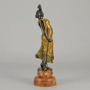 Flamenco Dancer by T Curts a charming Art Nouveau bronze figure of a flamboyant flamenco dancer holding a striking pose, her diaphonous gilded dress seductively draped over her, pinned and hinged to be removed in order to reveal her beautiful naked body