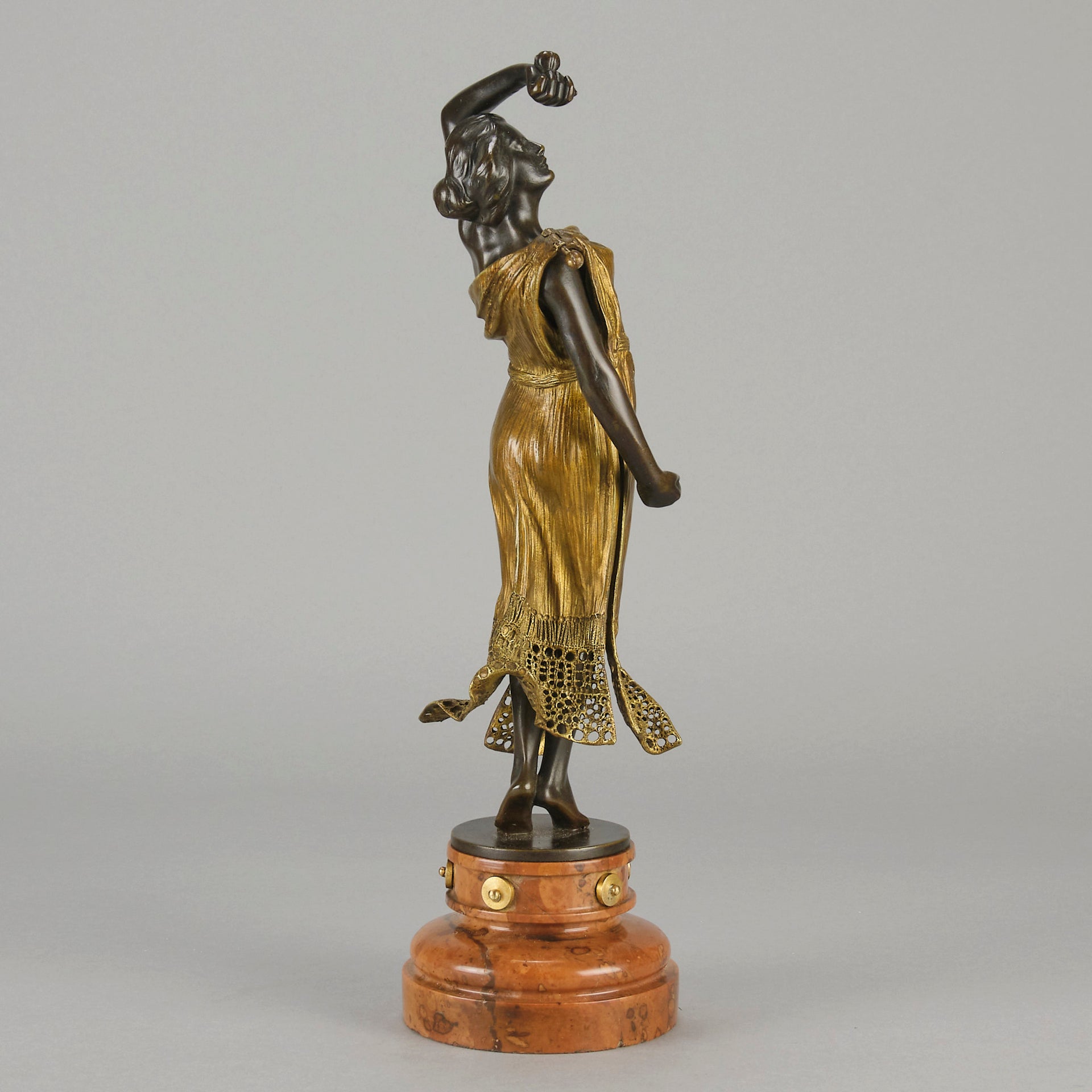 Flamenco Dancer by T Curts a charming Art Nouveau bronze figure of a flamboyant flamenco dancer holding a striking pose, her diaphonous gilded dress seductively draped over her, pinned and hinged to be removed in order to reveal her beautiful naked body